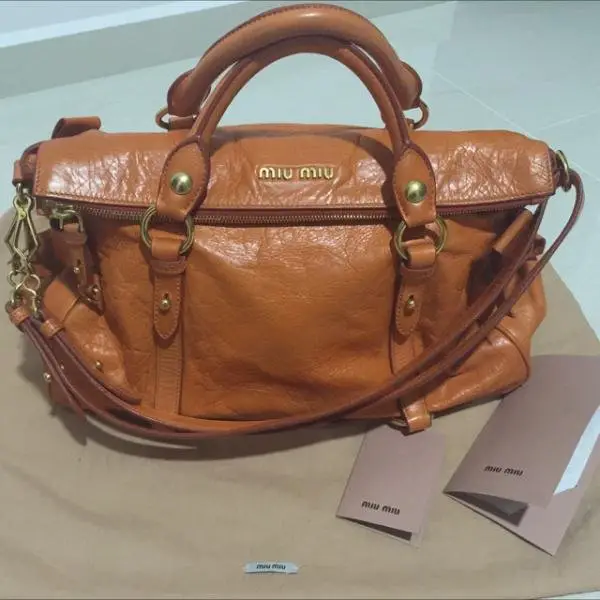 Item 1 Miu Miu Bow Bag_1.jpg